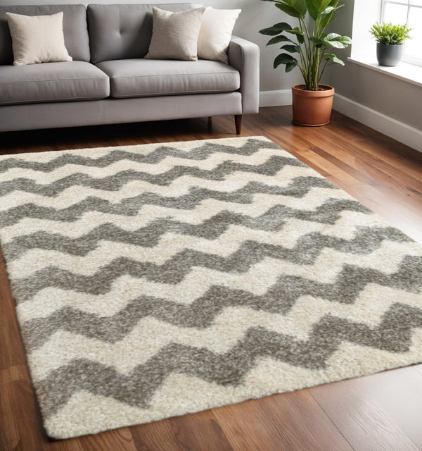 HomeRoots 2' Modern Grey and Ivory Geometric Shag Runner Rug - Soft, Stain-Resistant, Ideal for High-Traffic Areas 5' X 8' 507916
