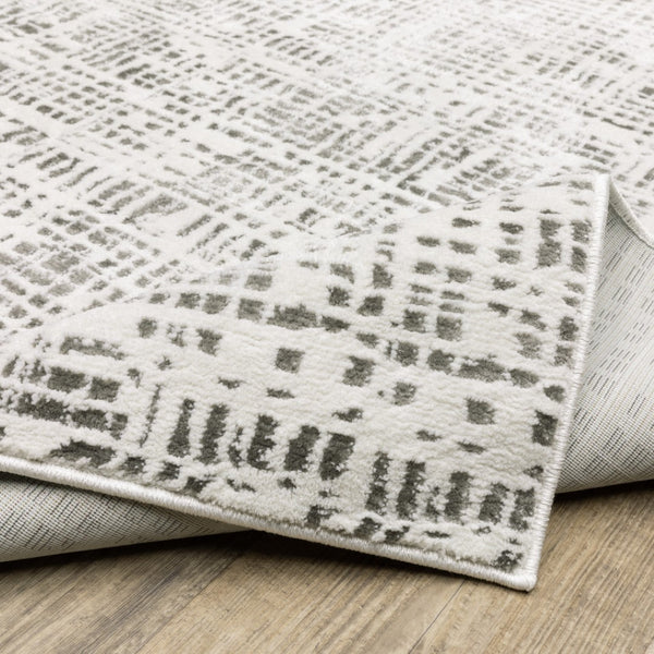 HomeRoots 2' X 8' Sleek White and Grey Abstract Power Loom Runner Rug - Stain Resistant for Busy Homes 2'3" x 7'6" 507920