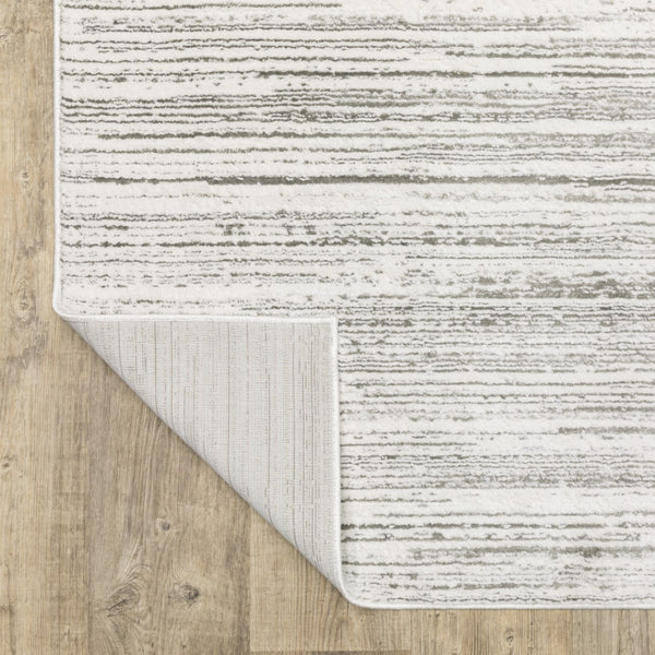 HomeRoots 2' X 8' Elegant White and Grey Abstract Runner Rug - Stain Resistant, Modern Style for High-Traffic Areas 2'3" x 7'6" 507926