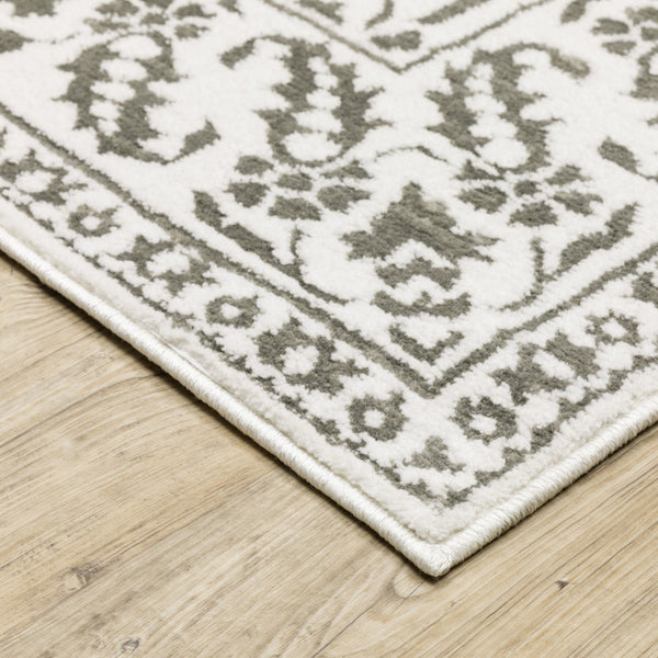 HomeRoots 2' Timeless Grey and White Floral Power Loom Runner Rug - Stain Resistant for High-Traffic Areas 5' X 8' 507940