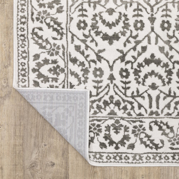 HomeRoots 2' Timeless Grey and White Floral Power Loom Runner Rug - Stain Resistant for High-Traffic Areas 7' X 10' 507941