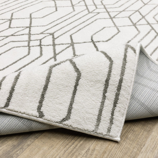 HomeRoots 2' White and Grey Geometric Runner Rug - Stain Resistant, Modern Design for High-Traffic Areas 3' x 5' 507945
