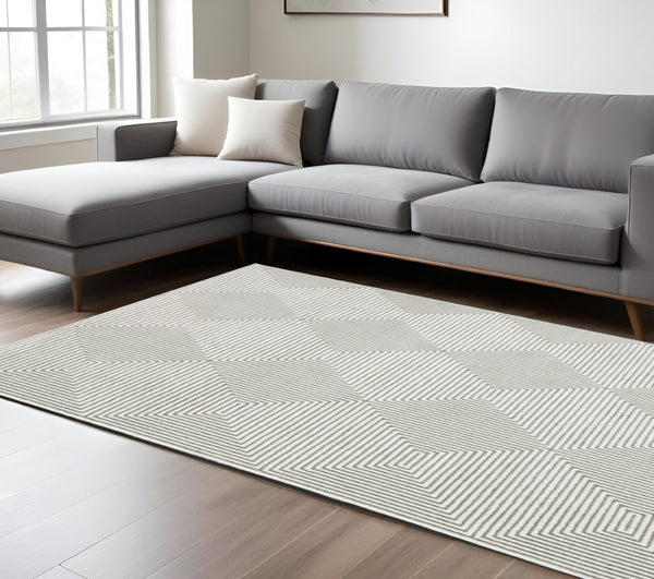 HomeRoots 2' Grey and White Geometric Runner Rug - Stain Resistant and Modern Design for High-Traffic Areas 8' X 11' 507954