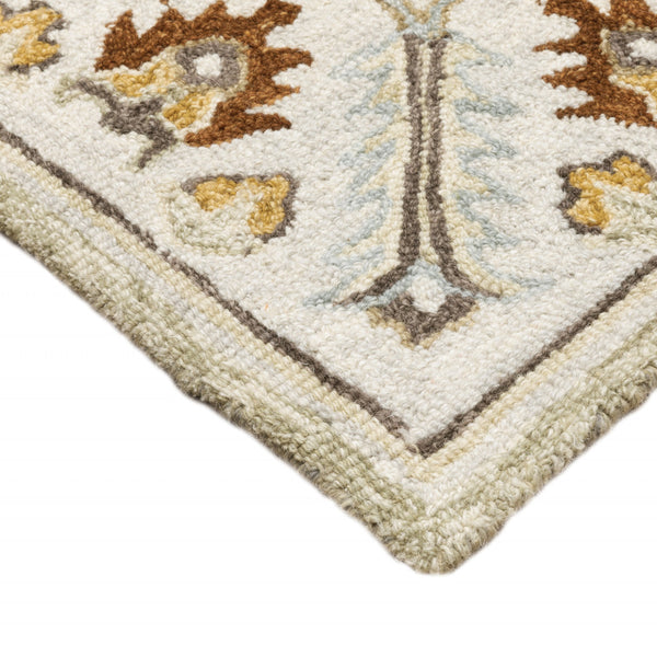 Homeroots 2' X 8' Ivory Beige Gold And Muted Grey Oriental Tufted Handmade Stain Resistant Runner Rug  Genuine Wool 508105