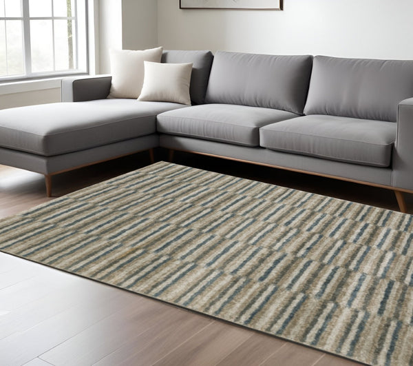HomeRoots 8' Abstract Distressed Runner Rug in Beige and Blue – Durable, Stain-Resistant Design for Hallways 7' X 10' 508134