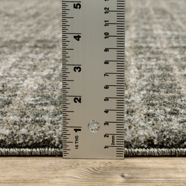 HomeRoots 8' Elegant Brown and Beige Geometric Distressed Runner Rug for Hallways, Entryways, and Living Spaces 2'3" x 7'6" 508137