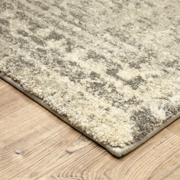 Homeroots 6' X 9' Grey Ivory Beige And Taupe Oriental Power Loom Stain Resistant Area Rug  Polypropylene 508323