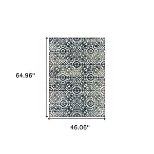 HomeRoots 2' Navy and Ivory Geometric Runner Rug – Durable, Stain Resistant, Perfect for High-Traffic Areas 4' X 6' 508357