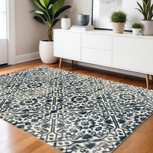 HomeRoots 2' Navy and Ivory Geometric Runner Rug – Durable, Stain Resistant, Perfect for High-Traffic Areas 4' X 6' 508357