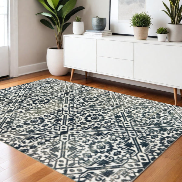 HomeRoots 2' Navy and Ivory Geometric Runner Rug – Durable, Stain Resistant, Perfect for High-Traffic Areas 4' X 6' 508357