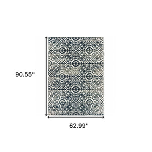 HomeRoots 2' Navy and Ivory Geometric Runner Rug – Durable, Stain Resistant, Perfect for High-Traffic Areas 5' X 8' 508358