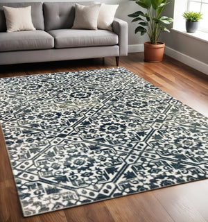 HomeRoots 2' Navy and Ivory Geometric Runner Rug – Durable, Stain Resistant, Perfect for High-Traffic Areas 5' X 8' 508358