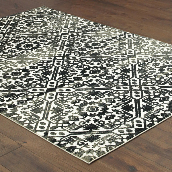 HomeRoots 2' Navy and Ivory Geometric Runner Rug – Durable, Stain Resistant, Perfect for High-Traffic Areas 8' X 11' 508360