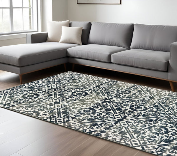 HomeRoots 2' Navy and Ivory Geometric Runner Rug – Durable, Stain Resistant, Perfect for High-Traffic Areas 8' X 11' 508360