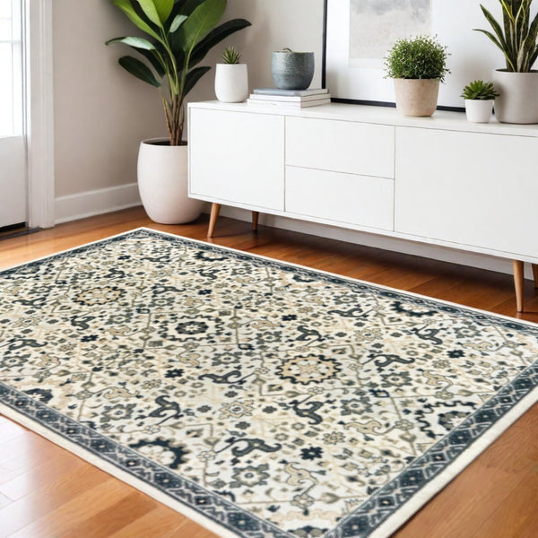 HomeRoots 2' Elegant Ivory, Navy & Gold Oriental Power Loom Runner Rug - Stain Resistant for Busy Homes 4' X 6' 508363