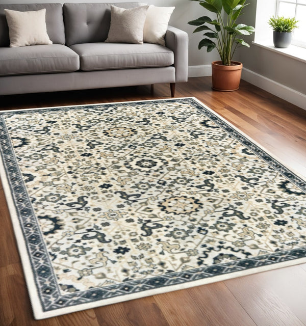HomeRoots 2' Elegant Ivory, Navy & Gold Oriental Power Loom Runner Rug - Stain Resistant for Busy Homes 5' X 8' 508364