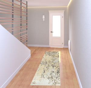 Homeroots 2' X 8' Grey And Gold Abstract Power Loom Stain Resistant Runner Rug  Polypropylene 508374