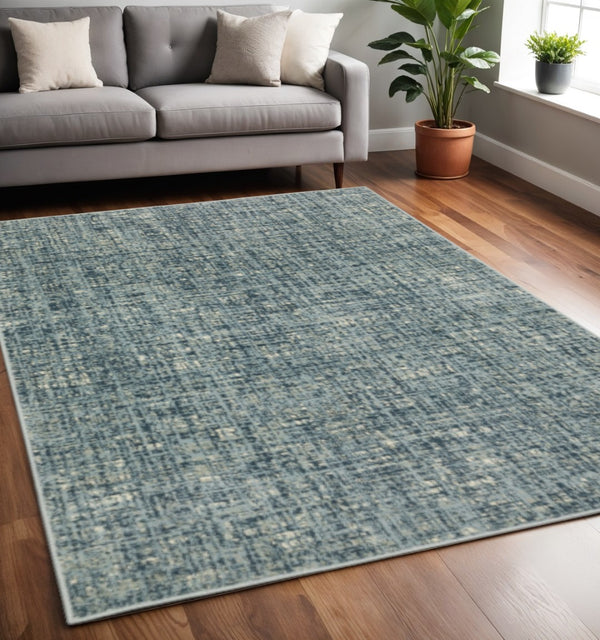 HomeRoots 5' Abstract Power Loomed Area Rug in Dark Blue, Teal, Grey, Ivory & Beige - Stain Resistant Style 5' X 7' 508387
