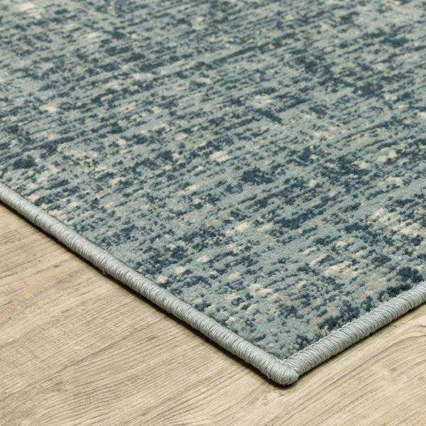 HomeRoots 5' Abstract Power Loomed Area Rug in Dark Blue, Teal, Grey, Ivory & Beige - Stain Resistant Style 5' X 7' 508387