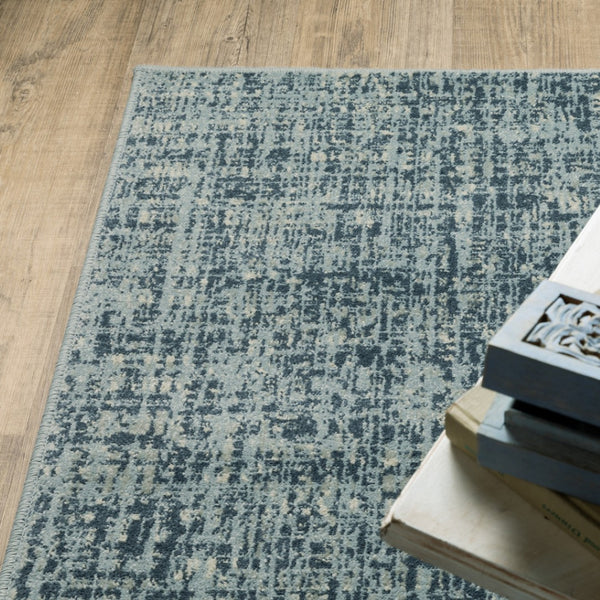 HomeRoots 5' Abstract Power Loomed Area Rug in Dark Blue, Teal, Grey, Ivory & Beige - Stain Resistant Style 5' X 7' 508387