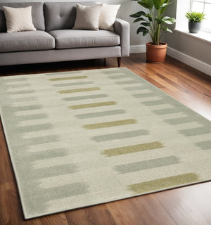 HomeRoots 5' Stain-Resistant Geometric Area Rug in Beige, Grey, Gold, and Green - Perfect for Modern Spaces 5' X 7' 508397
