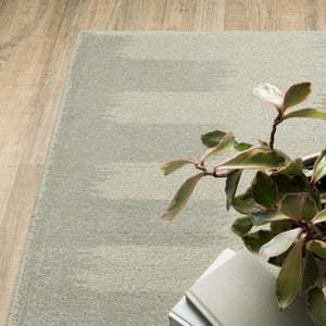 HomeRoots 5' Stain-Resistant Geometric Area Rug in Beige, Grey, Gold, and Green - Perfect for Modern Spaces 7' X 9' 508398