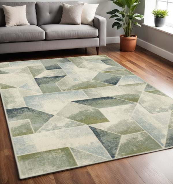 HomeRoots 5' Modern Geometric Area Rug in Blue, Green, Grey, Gold & Ivory - Stain Resistant & Easy Care 5' X 7' 508402