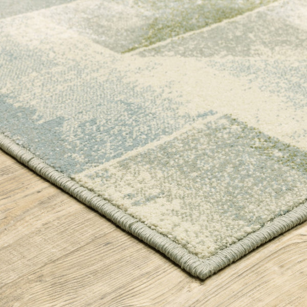 HomeRoots 5' Modern Geometric Area Rug in Blue, Green, Grey, Gold & Ivory - Stain Resistant & Easy Care 5' X 7' 508402
