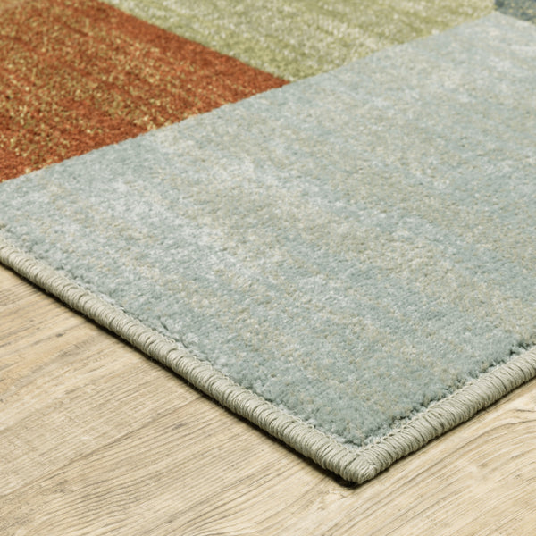 Homeroots 5' X 7' Grey Teal Blue Rust Green And Ivory Geometric Power Loom Stain Resistant Area Rug  Polypropylene 508407