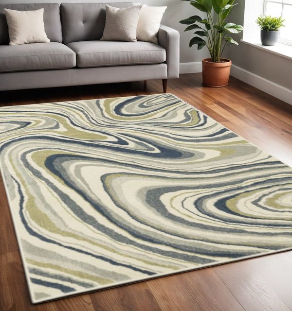 HomeRoots 5' Abstract Area Rug in Ivory, Blue, and Beige – Stain Resistant, Modern Design for Any Space 5' X 7' 508417