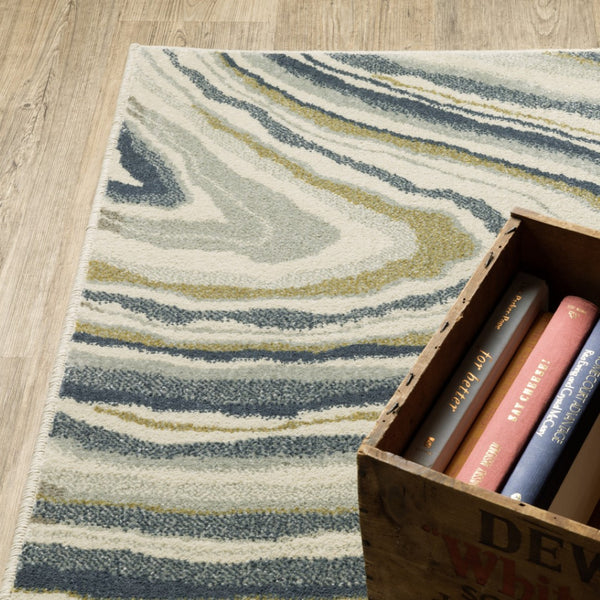 HomeRoots 5' Abstract Area Rug in Ivory, Blue, and Beige – Stain Resistant, Modern Design for Any Space 8' X 10' 508419