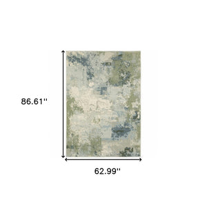 HomeRoots 5' Abstract Power Loom Area Rug in Blue, Green, Grey & Ivory – Stain Resistant for High-Traffic Areas 5' X 7' 508422