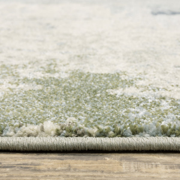 HomeRoots 5' Abstract Power Loom Area Rug in Blue, Green, Grey & Ivory – Stain Resistant for High-Traffic Areas 5' X 7' 508422