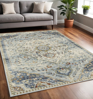 HomeRoots 5' Elegant Blue Beige Rust Gold Teal Oriental Area Rug - Stain Resistant, Durable & Timeless Style 5' X 7' 508432