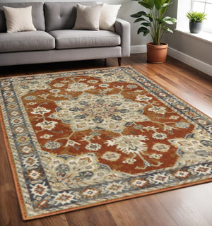 HomeRoots 5' Elegant Rust Beige Teal Blue Gold Oriental Area Rug - Stain Resistant & Durable for High-Traffic Spaces 5' X 7' 508442
