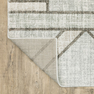 HomeRoots 2' Geometric Runner Rug in Soft Grey Beige and Blue - Stain Resistant for High-Traffic Areas 7' X 10' 508489