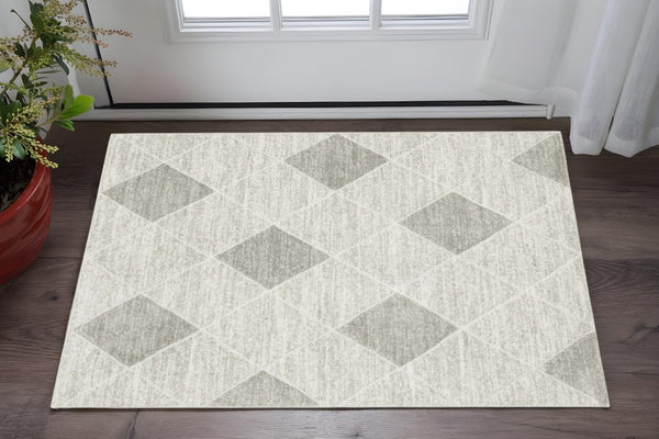 HomeRoots 2' Modern Grey and Ivory Geometric Runner Rug - Stain Resistant, Soft Pile for High-Traffic Areas 3' x 5' 508493