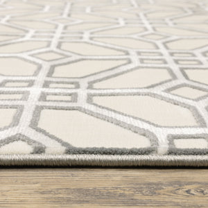 Homeroots 5' X 8' Ivory And Grey Geometric Power Loom Stain Resistant Area Rug  Polypropylene 508522