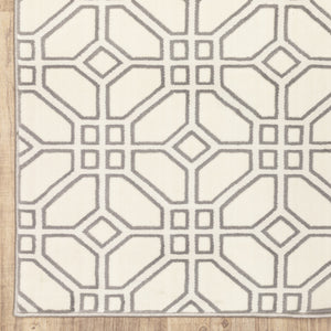 Homeroots 5' X 8' Ivory And Grey Geometric Power Loom Stain Resistant Area Rug  Polypropylene 508522