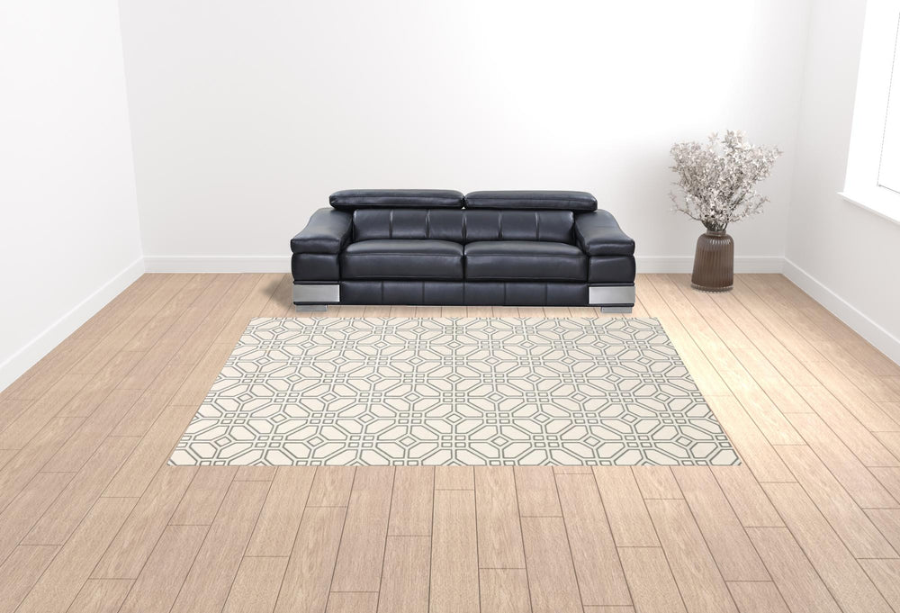 Homeroots 10' X 13' Ivory And Grey Geometric Power Loom Stain Resistant Area Rug  Polypropylene 508525