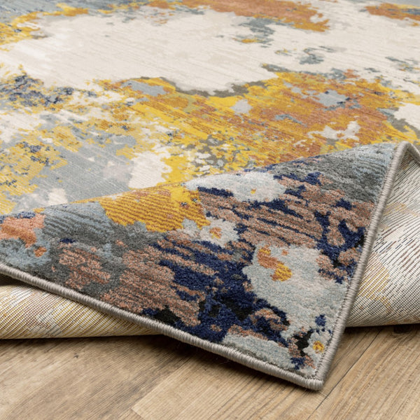 HomeRoots 2' Abstract Multi-Tone Power Loom Runner Rug in Yellow, Gold, Blue, Grey, Brown & Beige Decorate Spaces 2'3" x 7'6" 508610
