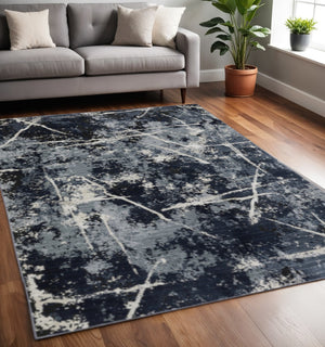 HomeRoots 2' Abstract Blue, Grey, and Beige Power-Loomed Stain-Resistant Runner Rug for Modern Spaces 5' X 8' 508624