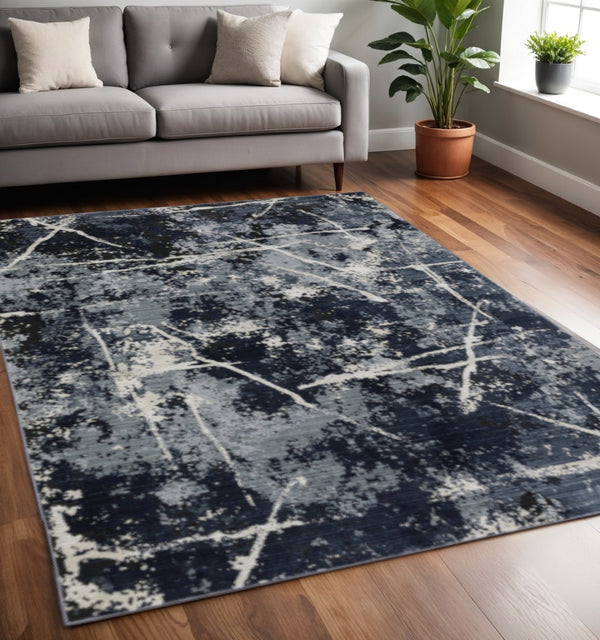 HomeRoots 2' Abstract Blue, Grey, and Beige Power-Loomed Stain-Resistant Runner Rug for Modern Spaces 5' X 8' 508624