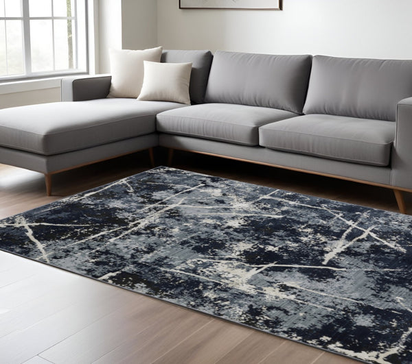 HomeRoots 2' Abstract Blue, Grey, and Beige Power-Loomed Stain-Resistant Runner Rug for Modern Spaces 8' X 11' 508626