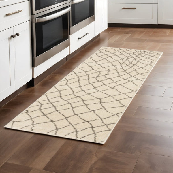HomeRoots 2' Ivory and Grey Geometric Runner Rug - Stain Resistant, Power Loomed Design for Modern Spaces 2'3" x 7'6" 508671