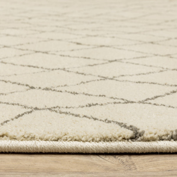 HomeRoots 2' Ivory and Grey Geometric Runner Rug - Stain Resistant, Power Loomed Design for Modern Spaces 2'3" x 7'6" 508671
