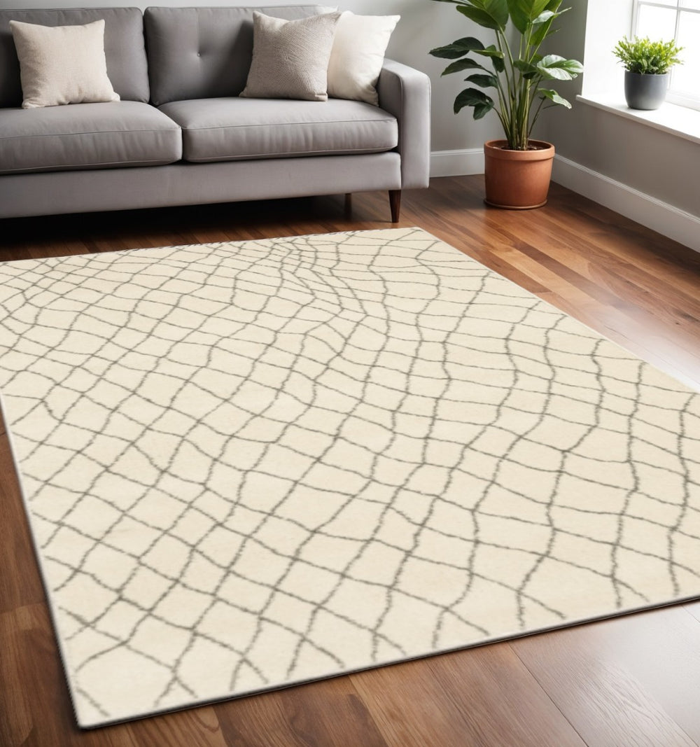 HomeRoots 2' Ivory and Grey Geometric Runner Rug - Stain Resistant, Power Loomed Design for Modern Spaces 5' X 7' 508674