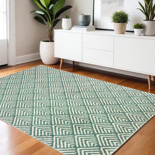 HomeRoots 2' Foam Blue and Ivory Geometric Runner Rug – Stain-Resistant, Durable, Perfect for High-Traffic Areas 4' X 6' 508687
