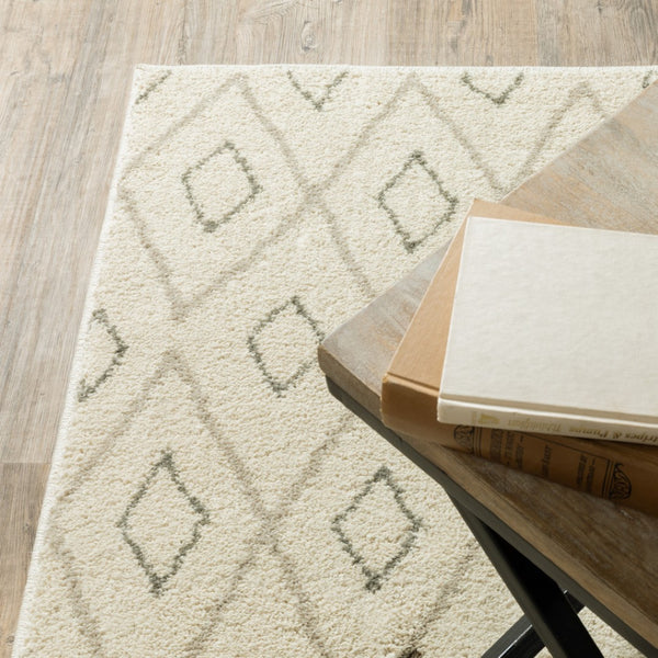 HomeRoots 2' Modern Geometric Sand Ash Grey and Ivory Stain-Resistant Runner Rug for High-Traffic Spaces 7' X 9' 508710