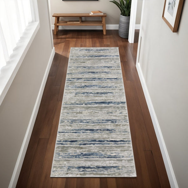 HomeRoots 2' Abstract Power Loom Runner Rug in Grey Blue, Light Blue, Ivory & Brown - Stain Resistant Style 2'3" x 7'6" 508778